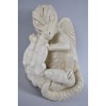 A Wall Hanging Cast Resin Study of Human Hand Holding Baby Dragon, 23cms High