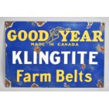 A Reproduction Rectangular Vintage Style Enamel Sign for "Goodyear Klingtite Farm Belts", 30x20cms