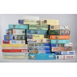 A Collection of Various Jigsaw Puzzles, Many Unopened