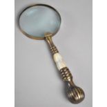 A Modern Large Desktop Magnifying Glass with Brass and Mother of Pearl Handle, 25.5cms Long