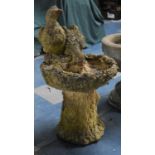 A Reconstituted Stone Bird Bath with Ducks