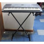 A Yamaha PSR 300 Keyboard With Adjustable Stand, Instruction Manual and Sheet Music and Books,