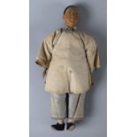 A Chinese 'Doll Of Hope' Doll with Carved Wooden Head, 27cms High