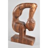 A Modern Carved Wooden Sculpture of a Gymnast, 30cms High