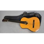 A Late 20th Century Chinese Acoustic Guitar, The Kent Palencia with Carrying Bag