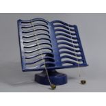 A Modern Blue Enamelled Cast Metal Recipe Book Stand, 26cms Wide