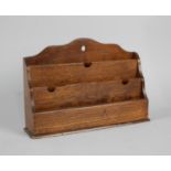 An Edwardian Oak Three Division Stationery Rack, 31cms Wide