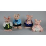 A Collection of Four Wade Natwest Piggy Banks