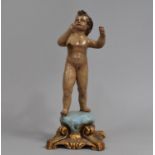 A Restored French Figure of Naked Child on Cushion, 34cms High