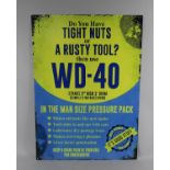 A Reproduction Printed Metal Amusing Advertising Sign for WD40, 40x70cms