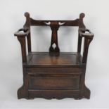 An Edwardian Oak Hall Seat and Stick Stand with Hinged Lid and Pierced Top Rail, 76cms Wide