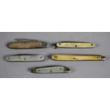 A Collection of Five Miniature Fruit Knives with Bone and Mother of Pearl Scales and One with Silver