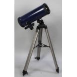 A Tasco "Galaxsee" Telescope on Tripod