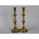 A Pair of 19th Century Brass Candlesticks, 26cms High