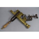 A Vintage Acme Brass Bar Mounting Automatic Corkscrew, 37cms High