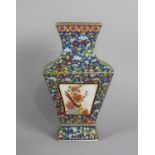 A Reproduction Chinese Vase of Tapering Square Panelled Form Decorated with Birds in Blooming