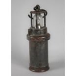 A Vintage Metal Cased Cylindrical Lamp with War Department Crows Feet Arrows, 26cms High