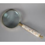 A Gilt Brass and Mother of Pearl Desktop Magnifying Glass, 25cms Long