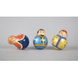 A Set of Three Vintage Russian Figural Painted Roly Poly Chime Dolls