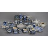 A Large Collection of Various 19th and 20th Century Blue and White Ceramics to Comprise Teapots,