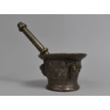 A Late 17th/Early 18th Century Bronze Pestle and Mortar, Body Moulded with Seashells, 11.5cms