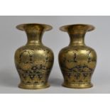 A Pair of Niello Brass Vases with Islamic Decoration, 20cms High