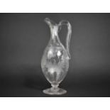 A 19th Century Etched Glass Ewer with Floral Garland and Swag Design, 30cm high