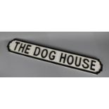 A Wooden Sign in the Form of a Cast Metal Road Sign, "The Dog House", 87cms Wide