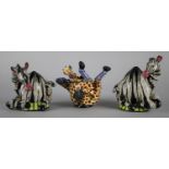 A Pair of Ardmore Cruets in the form of Zebra Together with a Giraffe Pot, Various condition Issues