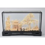 A Vintage Oriental Carved Cork Diorama Depicting Pagoda, Trees and Storks in Ebonized Glazed Display
