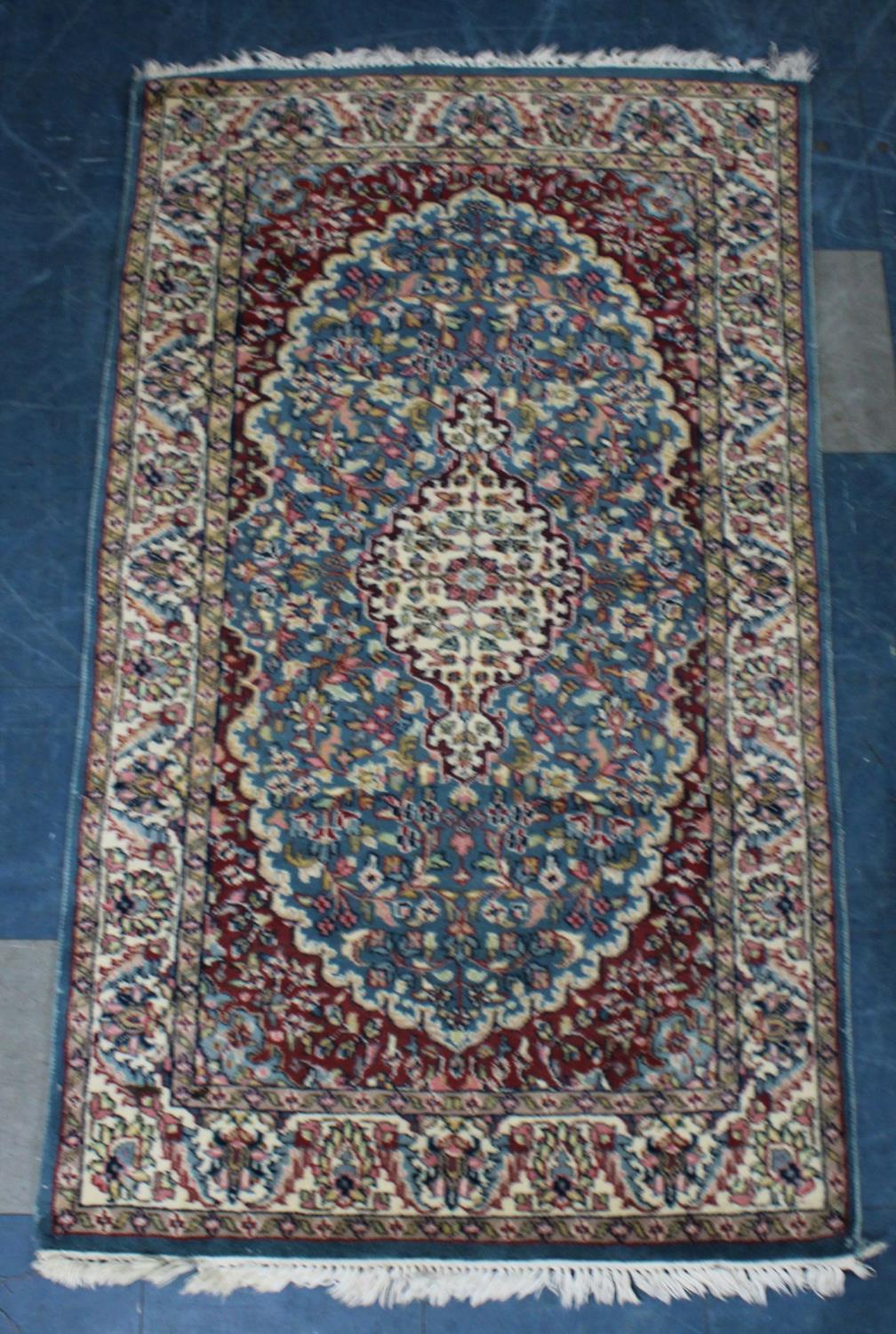 A Patterned Hearth Rug, 153x92cms