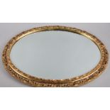 An Oval Gilt Framed Mirror, 51x42cm