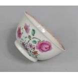 A Porcelain Tea Bowl Decorated in the Famille Rose Palette with Rose Design, 7.5cm diameter Chip