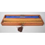 An Edwardian Mahogany Cased Set of Stanley Scale Rulers, 34cms Wide