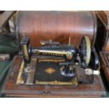 A Vintage Cased Manual Sewing Machine, The Defiance