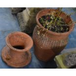 A Terracotta Reel Stand and a Vase, 30cms Diameter