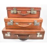 A Collection of Three Various Vintage Gradated Leather Cases, Largest 51cms Wide