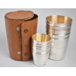 A Mid 20th Century Leather Cased Set of Four Large Stacking Silver Plated Drinking Cups together
