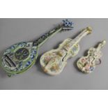 A French Tin Glazed Wall Pocket in the Form of a Mandolin Together with Two Violin Examples, 40cm