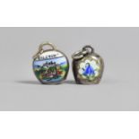 A White Metal Pendant in the Form of a Cow Bell with Enamelled Blue Bell Decoration Together with