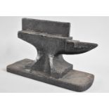 A Heavy Cast Metal Novelty Boot Scraper in the Form of a Blacksmith's Anvil, 25ms Long