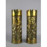 A Pair of Trench Art Brass Shell Cases Decorated in Relief with Roses, 23cms High