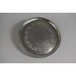 A Circular Keswick School of Industrial Art Firth Staybrite Circular Tray with Engraved Leaf