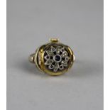 A Vintage Rolled Gold Ring Watch Having Jewelled Hinged Lid Revealing Prescott Miniature Watch