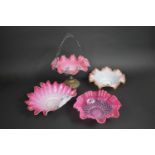 A Collection of Victorian Pink Opaque Glass Bowls with Reeded Ruffled Rims the One Example with