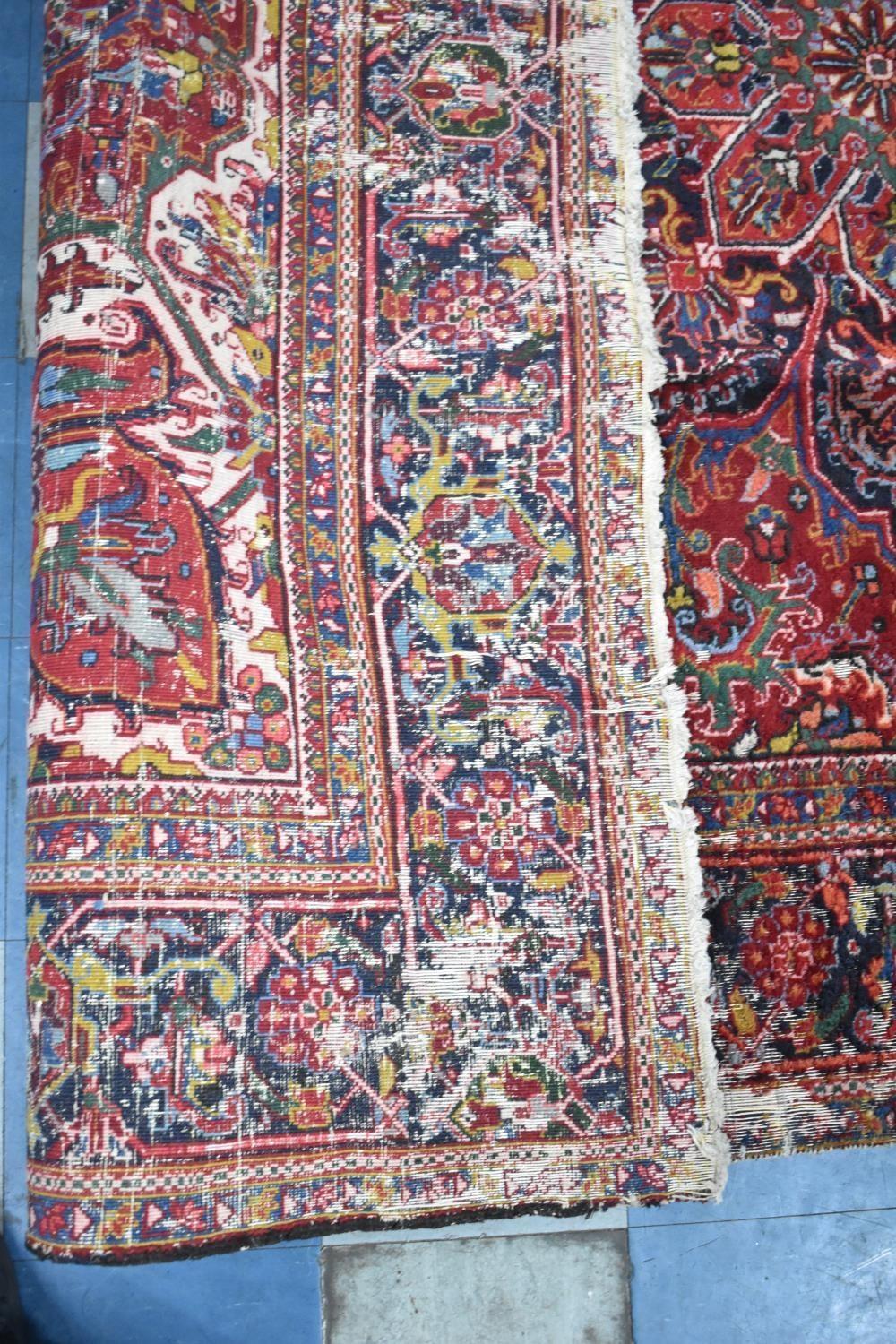 A Large Antique Persian Heriz Rug on Red Ground, Some Wear and Condition Issues, 340x240cms - Bild 6 aus 6