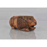 A 19th Century Coquilla Nut Snuff in the Form of a Lion, 8cms Long