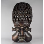 A Large Carved Wooden African Mask or Stand, 80cm High