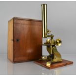 A 19th Century Cased Brass Microscope, Fitted Box with Tools, Lens and Base Drawer Containing