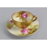 A Hand Painted Royal Worcester Miniature Cup and Saucer, Roses, Gilt Body and Trim. Condition: